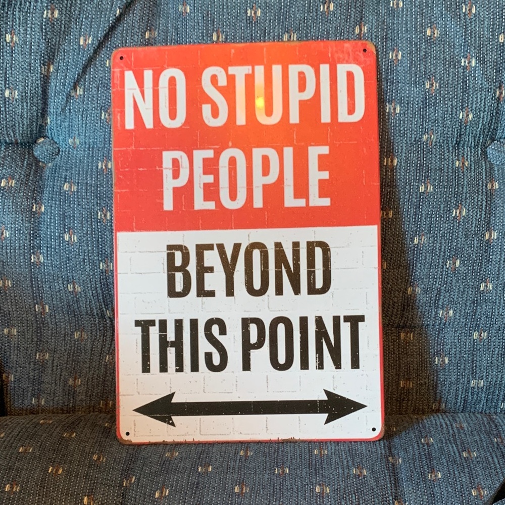 Red and White Metal Sign